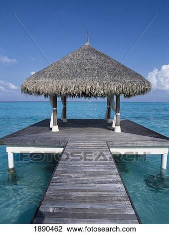 Stock Image - Jetty At Taj Exotica Resort. Fotosearch