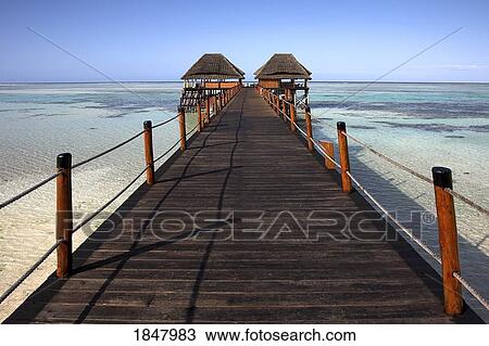 Jetty On Tropical Ocean; Indian Ocean, Zanzibar, Tanzania View Large Photo Image Stock Image - Jetty On Tropical Ocean; Indian Ocean, Zanzibar, Tanzania. Fotosearch