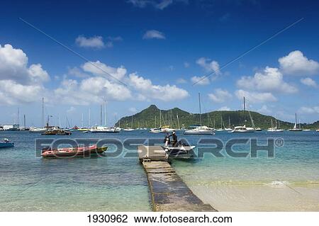 Jetty With Boats At Tyrell Bay On Carriacou Island; Grenada, Caribbean View Large Photo Image Stock Image - Jetty With Boats At Tyrell Bay On Carriacou Island; Grenada, Caribbean. Fotosearch