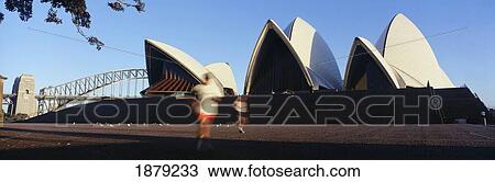 Stock Image - Jogger In Front Of Sydney Opera House, Sydney. Fotosearch