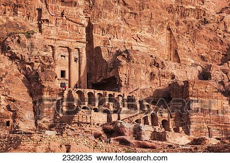 Stock Photography - Jordan, Facade of ancient rock buildings; Petra. Fotosearch