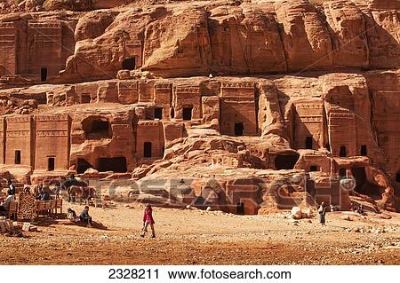 Stock Image - Jordan, Facades of ancient rock buildings; Petra. Fotosearch