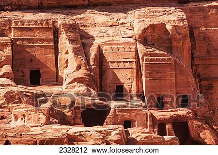 Stock Image - Jordan, Facades of ancient rock buildings; Petra. Fotosearch