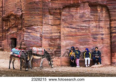 Jordan, Family and donkeys on Street of Facades; Petra View Large Photo Image Stock Photography - Jordan, Family and donkeys on Street of Facades; Petra. Fotosearch