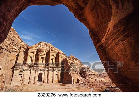 Jordan, it measures 50 metres wide by approximately 45 metres high; Petra, Ad Deir (Arabic for The Monastery) is monumental building carved out of rock in ancient city of Petra. Built by Nabataeans in 1st century View Large Photo Image Stock Photograph - Jordan, it measures 50 metres wide by approximately 45 metres high; Petra, Ad Deir (Arabic for The Monastery) is monumental building carved out of rock in ancient city of Petra. Built by Nabataeans in 1st century. Fotosearch