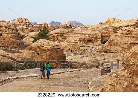 Jordan, People sightseeing ancient city; Petra View Large Photo Image Stock Photo - Jordan, People sightseeing ancient city; Petra. Fotosearch