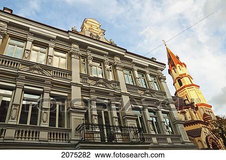Stock Image - Jugendstil Building & St. Nicholas Church, Vilnius, Lithuania. Fotosearch