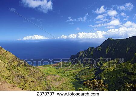 Kalalau Lookout and Kalalau Valley along the Na Pali Coast; Kauai, Hawaii, United States of America View Large Photo Image Stock Photo - Kalalau Lookout and Kalalau Valley along the Na Pali Coast; Kauai, Hawaii, United States of America. Fotosearch