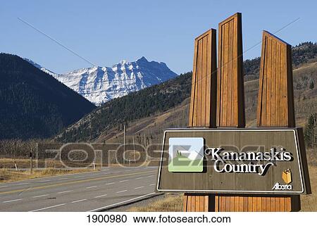 Kananaskis Country Road Sign With The Mountains In The Distance; Kananaskis, Alberta, Canada View Large Photo Image Stock Image - Kananaskis Country Road Sign With The Mountains In The Distance; Kananaskis, Alberta, Canada. Fotosearch