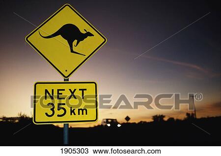 Stock Image - Kangaroo Road Sign With Bullet Holes, Central Australia.. Fotosearch
