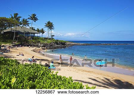 Stock Photo - Kapalua Beach with Merriman's Restaurant at the far end of the beach on the point; Kapalua, Maui, Hawaii, United States of America. Fotosearch