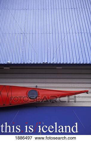 Stock Photo - Kayak And Sign On Building, Close Up. Fotosearch