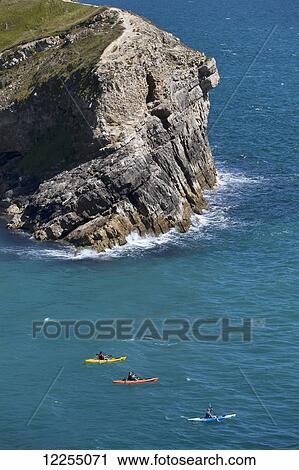 Kayakers, Lulworth Cove; Dorset, England View Large Photo Image Stock Image - Kayakers, Lulworth Cove; Dorset, England. Fotosearch