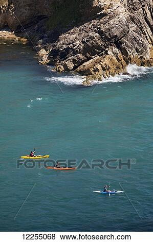 Kayakers, Lulworth Cove; Dorset, England View Large Photo Image Stock Photo - Kayakers, Lulworth Cove; Dorset, England. Fotosearch