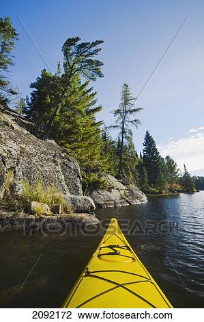 Kayaking In Northwestern Ontario; Lake Of The Woods Ontario Canada View Large Photo Image Stock Image - Kayaking In Northwestern Ontario; Lake Of The Woods Ontario Canada. Fotosearch