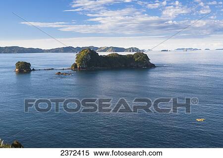 Stock Photography - Kayaks In Coromandel Peninsula; New Zealand. Fotosearch