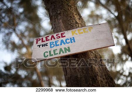 Stock Photo - Keep the beach clean sign Turtle Beach, Goa, India.. Fotosearch