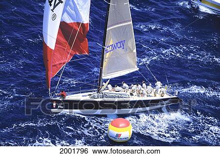 Stock Photograph - Kenwood Cup, Aerial Side View Of Yacht Nearing The Race Buoy, Choppy Waters. Fotosearch