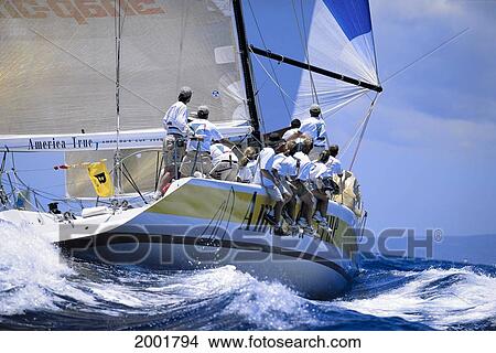 Picture - Kenwood Cup, Close-Up View Of Crew On Yacht Tacking, Blue Waters. Fotosearch