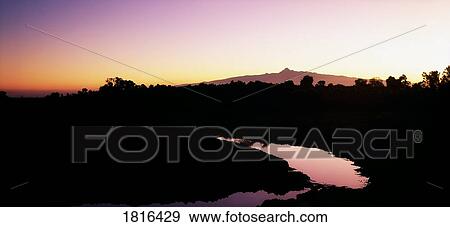 Kenya, Africa; Sunset From The Arc View Large Photo Image Stock Photo - Kenya, Africa; Sunset From The Arc. Fotosearch