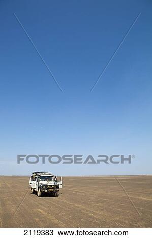 Stock Image - Kenya, Crossing remote desert; Chalbi Desert. Fotosearch