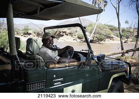 Kenya, Driver from Joy's Camp in safari Landcruiser; Shaba National Reserve View Large Photo Image Stock Image - Kenya, Driver from Joy's Camp in safari Landcruiser; Shaba National Reserve. Fotosearch