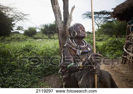 Stock Photo - Kenya, Lake Baringo; Rift Valley, Portrait of traditionally dressed senior woman from Pokot tribe. Fotosearch
