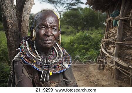 Stock Photo - Kenya, Lake Baringo; Rift Valley, Portrait of traditionally dressed senior woman from Pokot tribe. Fotosearch