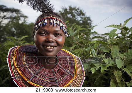 Kenya, Lake Baringo; Rift Valley, Portrait of traditionally dressed woman from Pokot tribe View Large Photo Image Stock Photo - Kenya, Lake Baringo; Rift Valley, Portrait of traditionally dressed woman from Pokot tribe. Fotosearch