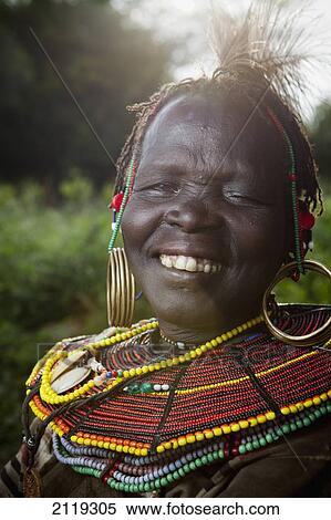 Stock Photography - Kenya, Lake Baringo; Rift Valley, Portrait of traditionally dressed woman from Pokot tribe. Fotosearch