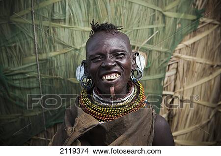 Kenya, Portrait of traditionally dressed Turkana woman on Lake Turkana; Loyangalani View Large Photo Image Picture - Kenya, Portrait of traditionally dressed Turkana woman on Lake Turkana; Loyangalani. Fotosearch