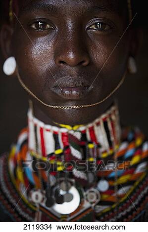 Picture - Kenya, Portrait of young Samburu man (Moran) in traditional dress; South Horr. Fotosearch