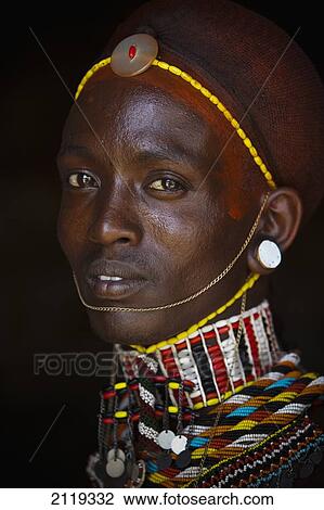 Kenya, Portrait of young Samburu man (Moran) in traditional dress; South Horr View Large Photo Image Stock Image - Kenya, Portrait of young Samburu man (Moran) in traditional dress; South Horr. Fotosearch