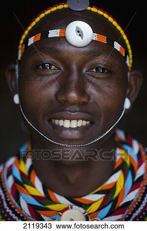 Kenya, Portrait of young Samburu man (Moran) in traditional dress; South Horr View Large Photo Image Stock Image - Kenya, Portrait of young Samburu man (Moran) in traditional dress; South Horr. Fotosearch