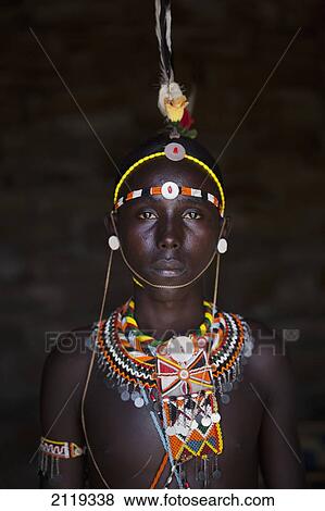 Kenya, Portrait of young Samburu man (Moran) in traditional dress; South Horr View Large Photo Image Stock Photo - Kenya, Portrait of young Samburu man (Moran) in traditional dress; South Horr. Fotosearch