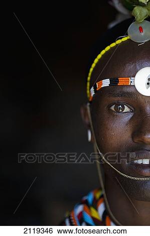 Kenya, Portrait of young Samburu man (Moran) in traditional dress; South Horr View Large Photo Image Stock Photograph - Kenya, Portrait of young Samburu man (Moran) in traditional dress; South Horr. Fotosearch