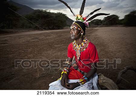 Picture - Kenya, Portrait of young Samburu Moran (warrior) in traditional dress; South Horr. Fotosearch