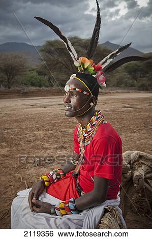 Kenya, Portrait of young Samburu Moran (warrior) in traditional dress; South Horr View Large Photo Image Stock Photograph - Kenya, Portrait of young Samburu Moran (warrior) in traditional dress; South Horr. Fotosearch