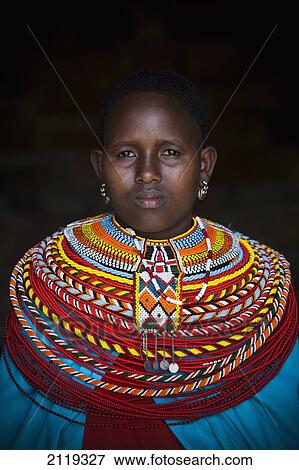 Stock Photo - Kenya, Portrait of young Samburu woman in traditional dress; South Horr. Fotosearch
