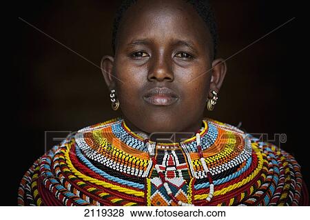 Stock Photo - Kenya, Portrait of young Samburu woman in traditional dress; South Horr. Fotosearch
