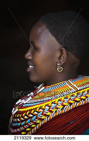 Stock Photo - Kenya, Portrait of young Samburu woman in traditional dress; South Horr. Fotosearch