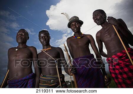 Kenya, Rift Valley, Portrait of traditionally dressed group of men from Pokot tribe; Lake Baringo View Large Photo Image Stock Image - Kenya, Rift Valley, Portrait of traditionally dressed group of men from Pokot tribe; Lake Baringo. Fotosearch