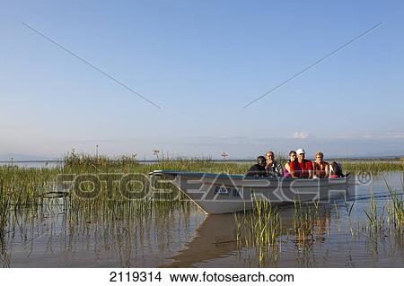 Kenya, Rift Valley, Tourists on boat trip; Lake Baringo View Large Photo Image Picture - Kenya, Rift Valley, Tourists on boat trip; Lake Baringo. Fotosearch