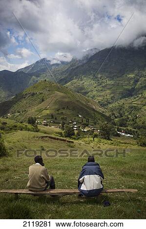 Kenya, Two men sitting on bench in Cherangani hills; Western Highlands View Large Photo Image Stock Image - Kenya, Two men sitting on bench in Cherangani hills; Western Highlands. Fotosearch