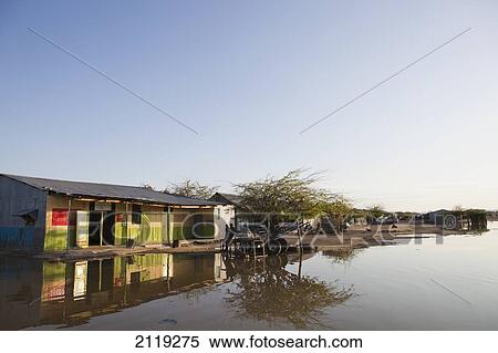 Kenya, View of village with flooded street; Turkana View Large Photo Image Stock Photography - Kenya, View of village with flooded street; Turkana. Fotosearch