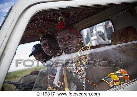 Kenya, View of young Samburu warriors (Moran) in lorry cab; Near Maralal View Large Photo Image Stock Photo - Kenya, View of young Samburu warriors (Moran) in lorry cab; Near Maralal. Fotosearch