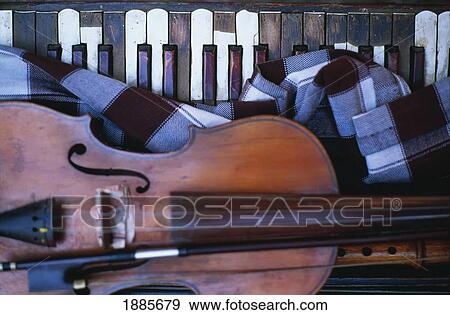Keyboard, Wooden Flute And Violin, Close Up View Large Photo Image Stock Photo - Keyboard, Wooden Flute And Violin, Close Up. Fotosearch
