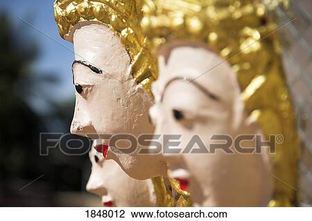 Stock Image - Khorat, Thailand; Close-Up Detail Of Sculpture On Southeast Asian Temple. Fotosearch
