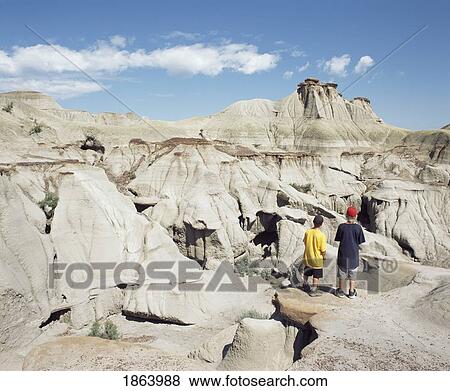 Kids Hiking In The Hoodoos, Drumheller, Alberta, Canada View Large Photo Image Stock Photo - Kids Hiking In The Hoodoos, Drumheller, Alberta, Canada. Fotosearch