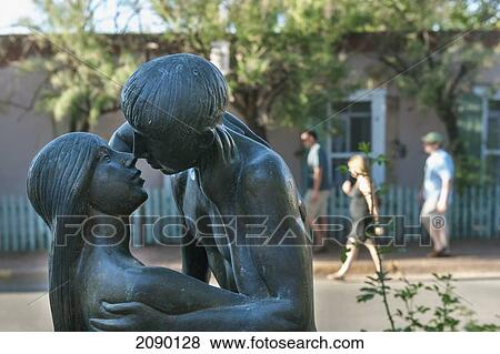 Kissing Couple Statue At Friday Night Canyon Road Gallery Walk In Santa Fe, New Mexico, Usa View Large Photo Image Stock Photo - Kissing Couple Statue At Friday Night Canyon Road Gallery Walk In Santa Fe, New Mexico, Usa. Fotosearch